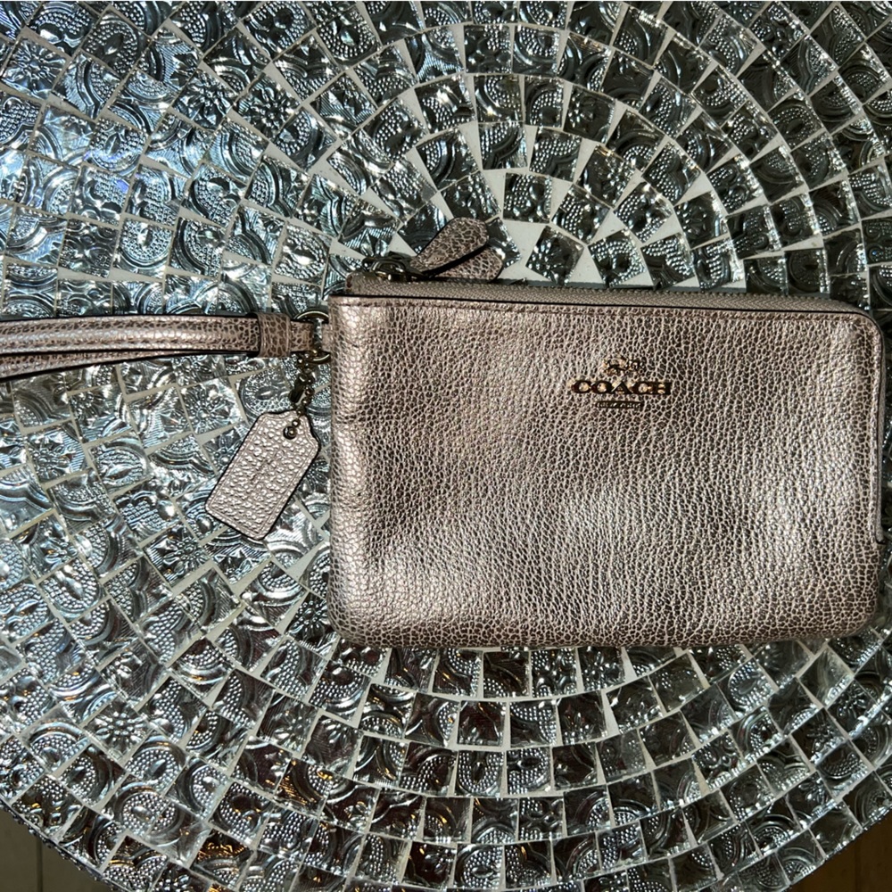 Metallic gold Coach double zipper wristlet